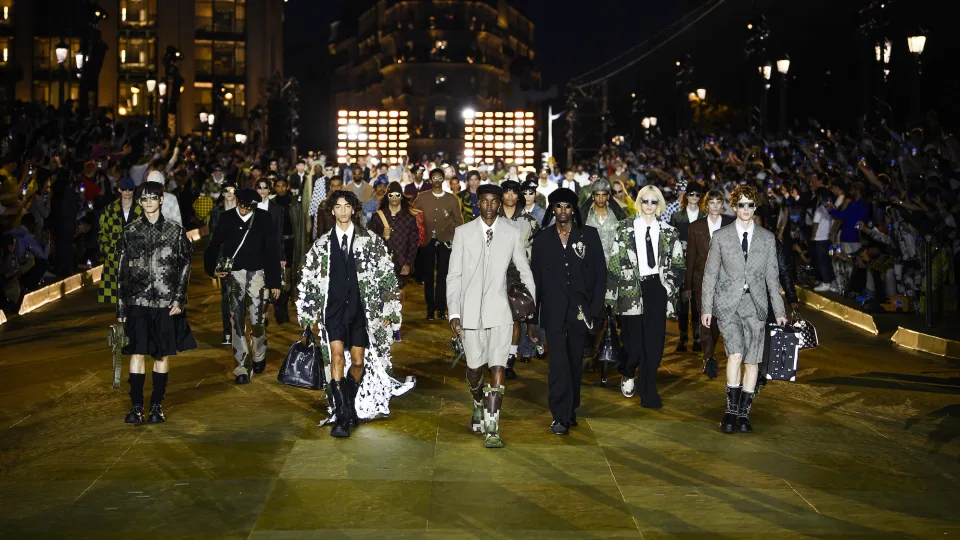 Pharrell in Paris wearing a full Louis Vuitton monogram biker